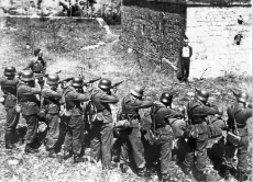 Georges Blind, a member of the French resistance, smiling at a German firing squad, 1944.jpg