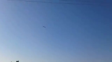 Video of a flying rocket over civilians in Syria. - - Date and location are unknown.mp4