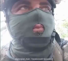 Georgian Mercenary Showing Off - Russian Artillery Gives Him A Shrapnel Bite.mp4