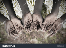 stock-photo-african-children-holding-hands-cupped-to-beg-help-poor-african-children-keeping-their-cupped-hands-322041716.jpg