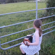 Little_Girl_Serenades_Herd_of_Cows.mp4