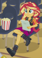 1790389__safe_screencap_sunset shimmer_equestria girls_stressed in show_spoiler-colon-eqg series_cropped_crossed legs_food_geode of empathy_popcorn.png