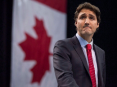 justin-trudeau-canadian-flag-08019307-chris-young-cp.jpg
