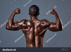 stock-photo-fit-strong-black-man-with-sexy-lean-body-showing-his-toned-back-muscles-399191254.jpg
