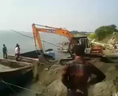 The idea was to load the excavator on the boat.mp4