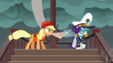 Applejack_and_Rarity_fight_over_the_map.png