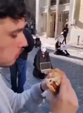 Eating a Burger at a Vegan Protest.mp4